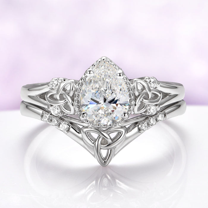 Celtic Knot Lab Grown Diamond Engagement Ring Set in 14K White Gold by Aquamarise Gold, featuring a pear-shaped diamond with intricate Celtic knotwork and delicate diamond accents.