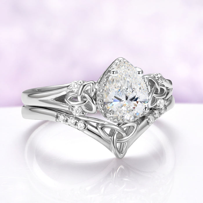 Celtic Knot Lab Grown Diamond Engagement Ring Set in 14K White Gold by Aquamarise Gold, featuring a pear-shaped diamond with intricate Celtic knot details and delicate accent stones.