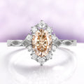 Champagne Moissanite Vintage Engagement Ring in 14K White Gold by Aquamarise Gold, showcasing an oval champagne moissanite center with a diamond halo and detailed vintage-inspired band design.