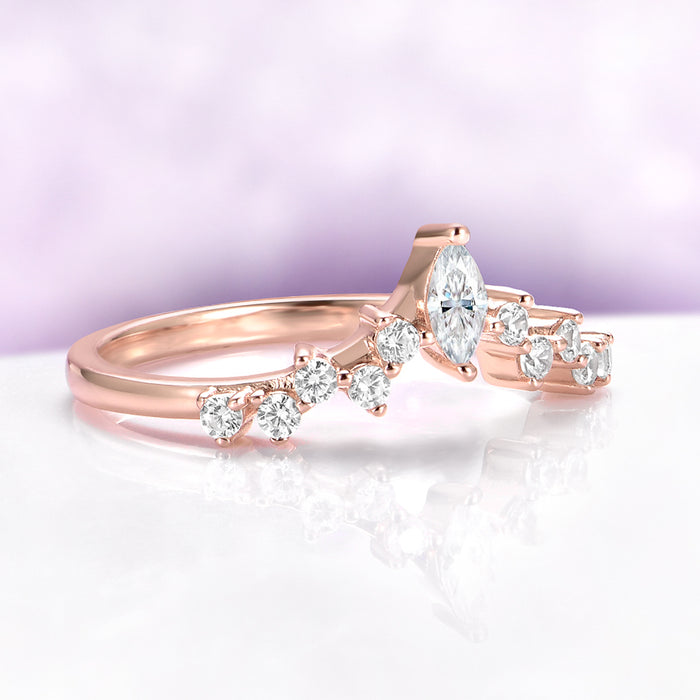 Chevron Curved Wedding Band in 14K Rose Gold Vermeil by Aquamarise, featuring a marquise center stone with round diamonds on a delicate curved rose gold band.