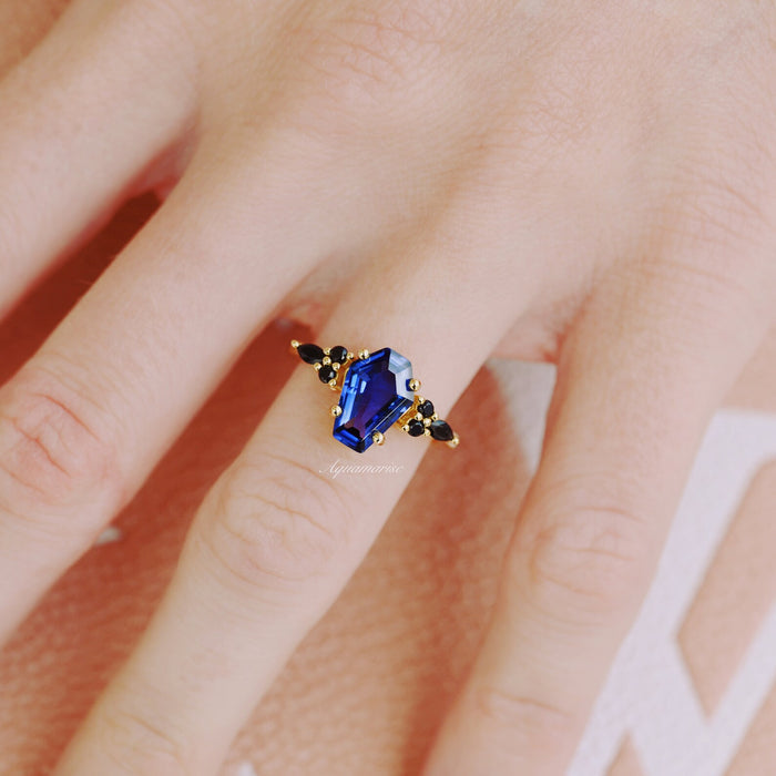 Coffin Cut Blue Sapphire and Gold Leaf Couples Ring Set featuring a bold sapphire flanked by black gemstones in gold, crafted by Aquamarise for Matching Couples' Rings collections.