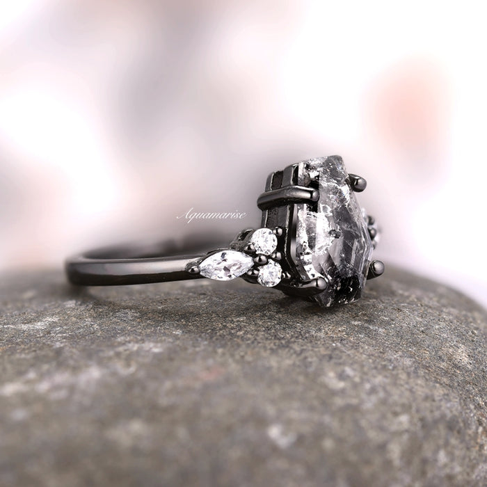 Coffin cut Herkimer diamond with simulated diamond side stones on a black ruthenium band