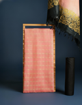 Unstitched Katan silk suit set with a soft coral pink fabric printed in small metallic dash motifs and a contrasting black piece with dense floral vine block print and a wide ornate multi-layered fringed border.