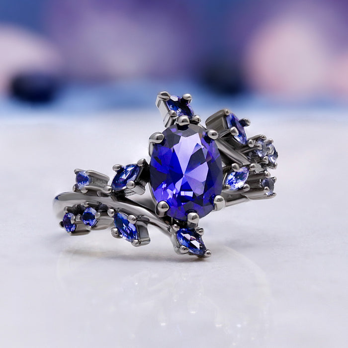Cornflower Blue Sapphire Leaf Engagement Ring in Black Ruthenium – in gift box
