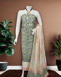 Cream and white Katan silk unstitched suit set hand block printed with a small all-over fish motif in green, black and peach, sparse fish motifs on the dupatta and a zigzag border at the hem.