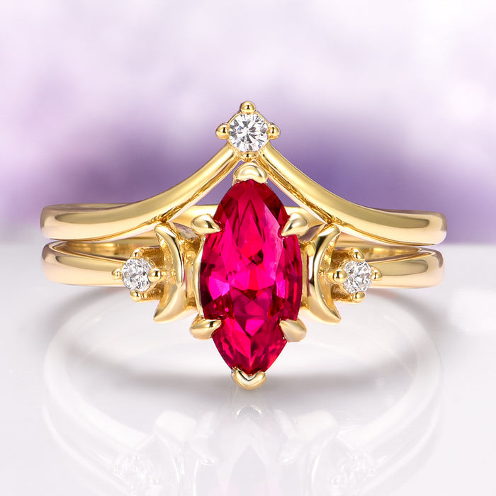 Crescent Moon Ruby Engagement Ring Set in 14K Solid Yellow Gold featuring a vibrant marquise-cut ruby center stone flanked by delicate crescent moon accents and sparkling round diamonds, designed by Aquamarise Gold.