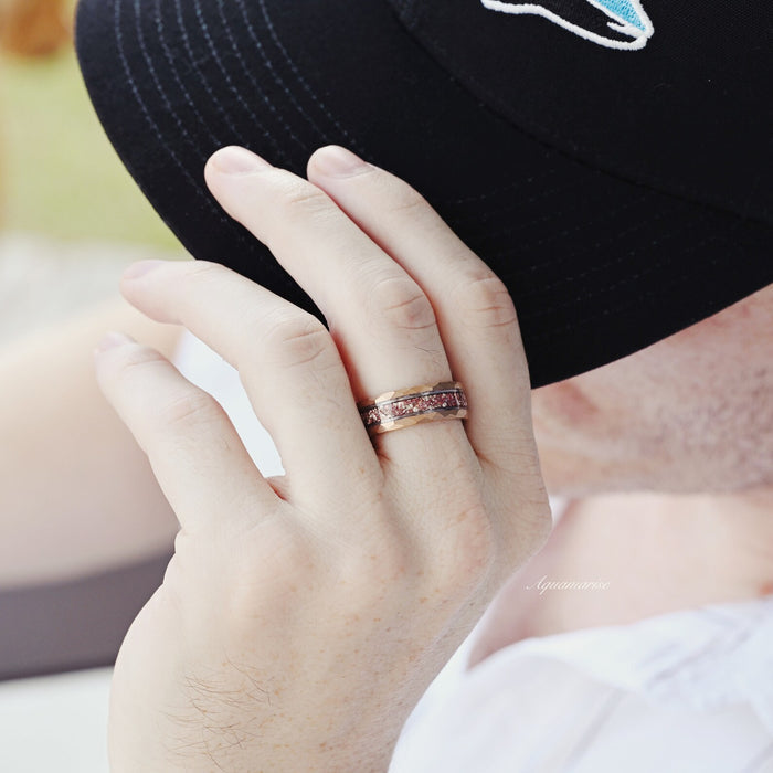 Man wearing a Crushed Morganite Wedding Band in Two-Tone Tungsten Carbide (8mm) by Aquamarise, featuring a blush pink crushed morganite inlay in a durable, stylish design.