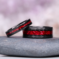 Crushed Red Garnet Couples Ring Set by Aquamarise featuring matching hammered black tungsten bands with vibrant crushed red garnet inlay, perfect for meaningful couple rings.