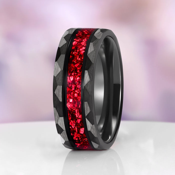 Crushed Red Garnet Couples Ring Set by Aquamarise featuring a bold black band with hammered texture and a vibrant crushed red garnet inlay, a unique matching couples' ring design.