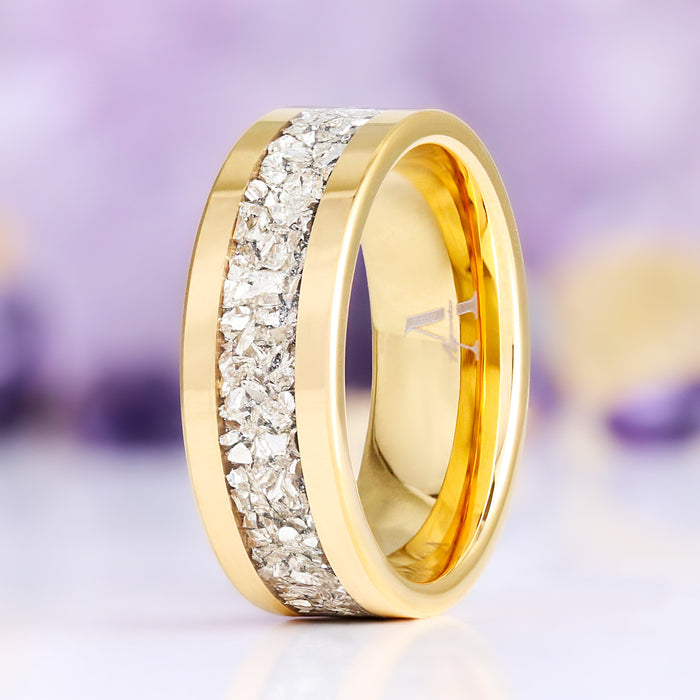 Interior of the gold tungsten wedding band showing the comfort fit dome and Aquamarise hallmark