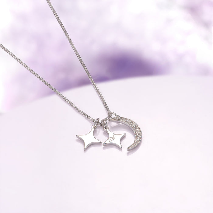 Custom Initial Necklace with Moon and Stars in Sterling Silver by Aquamarise, featuring a delicate crescent moon and two star charms on a sturdy chain from curated jewelry collections.