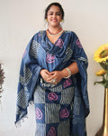 Dark blue striped katan silk unstitched suit set with pink heart-shaped floral hand block print and a fringed dupatta edge