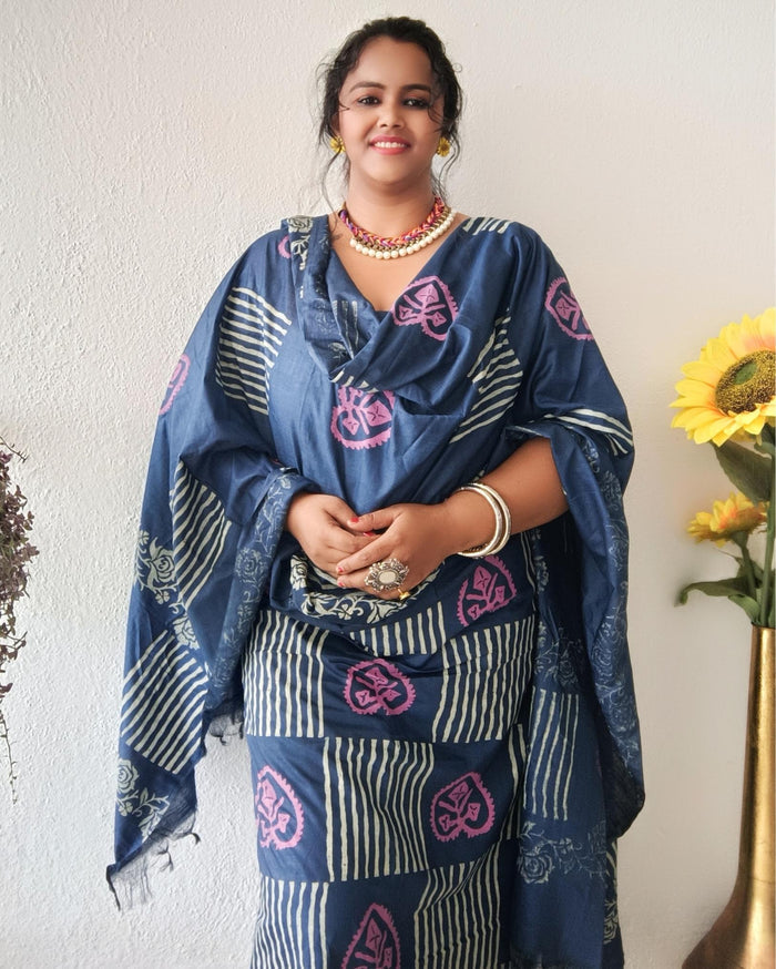 Dark blue striped katan silk unstitched suit set with pink heart-shaped floral hand block print and a fringed dupatta edge