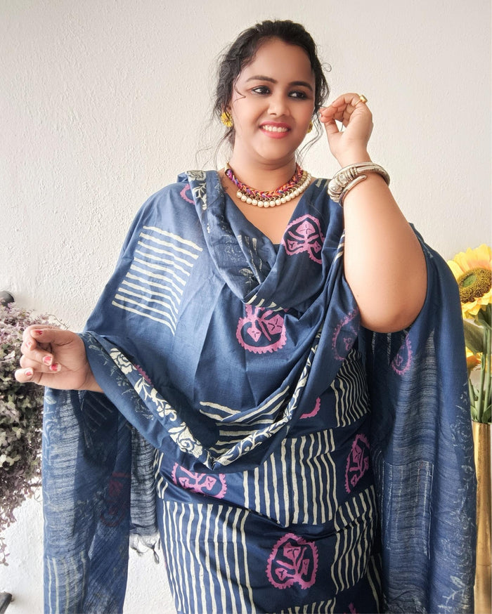 Dark blue striped katan silk unstitched suit set with pink heart-shaped floral hand block print and a fringed dupatta edge