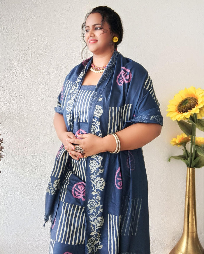 Dark blue striped katan silk unstitched suit set with pink heart-shaped floral hand block print and a fringed dupatta edge