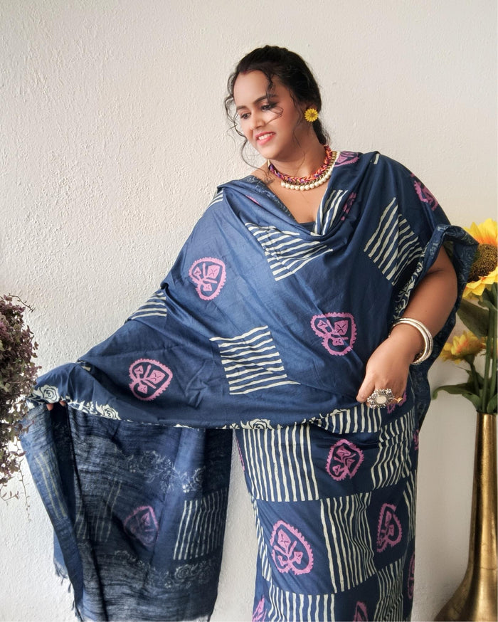 Dark blue striped katan silk unstitched suit set with pink heart-shaped floral hand block print and a fringed dupatta edge
