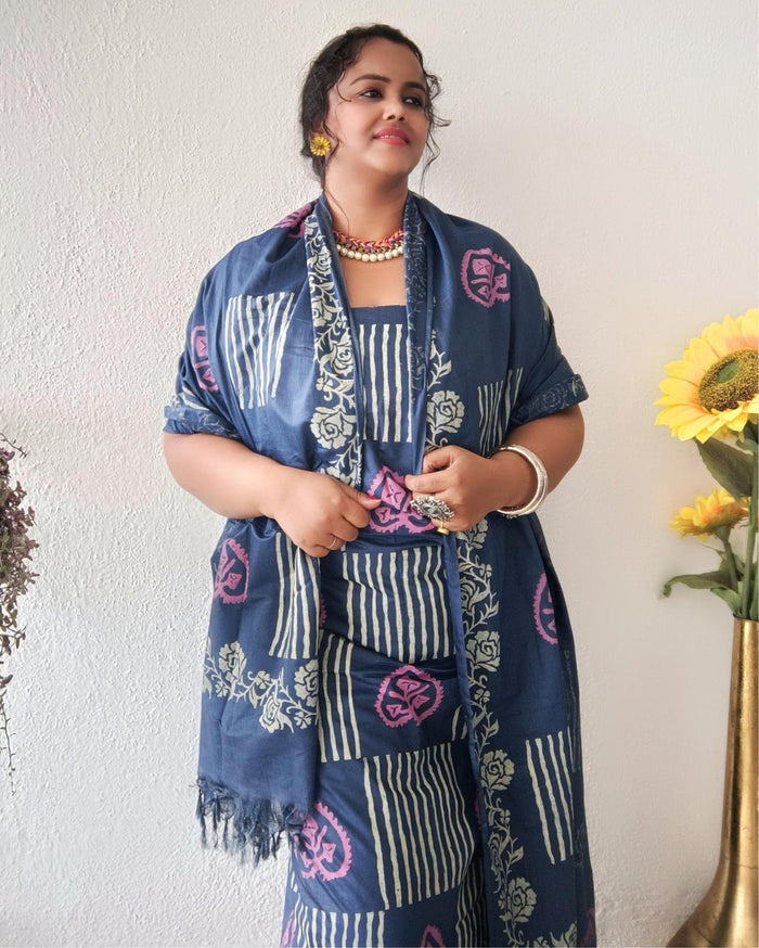 Dark blue striped katan silk unstitched suit set with pink heart-shaped floral hand block print and a fringed dupatta edge