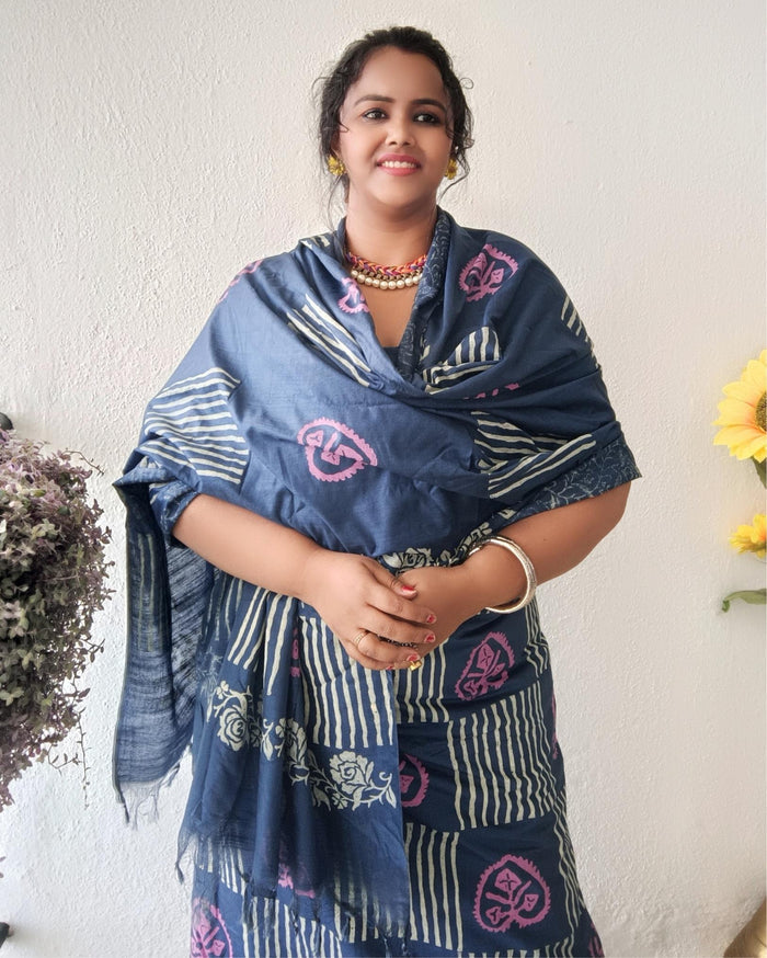 Dark blue striped katan silk unstitched suit set with pink heart-shaped floral hand block print and a fringed dupatta edge