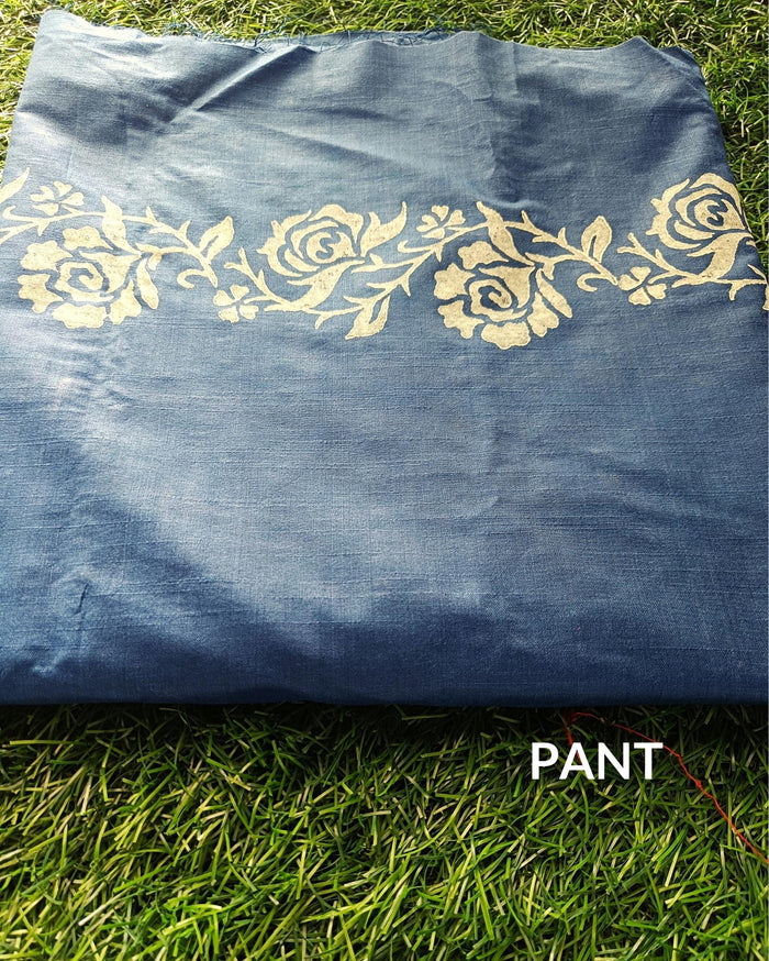 Dark blue striped katan silk unstitched suit set with pink heart-shaped floral hand block print and a fringed dupatta edge