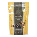 150g Packaging of Nutworks Dark Chocolate Ginger, showing a clear window with the product inside, crystalised ginger covered in dark chocolate, and text describing the product.