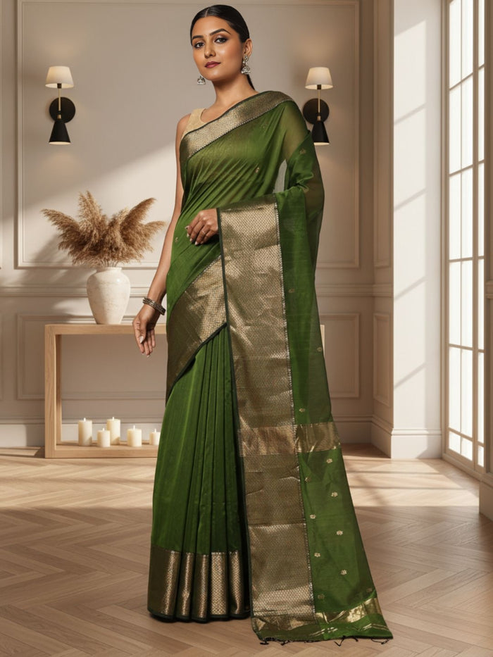 Handloom Maheshwari silk saree in dark olive green, flower buti scattered across the body, with a wide golden zari border