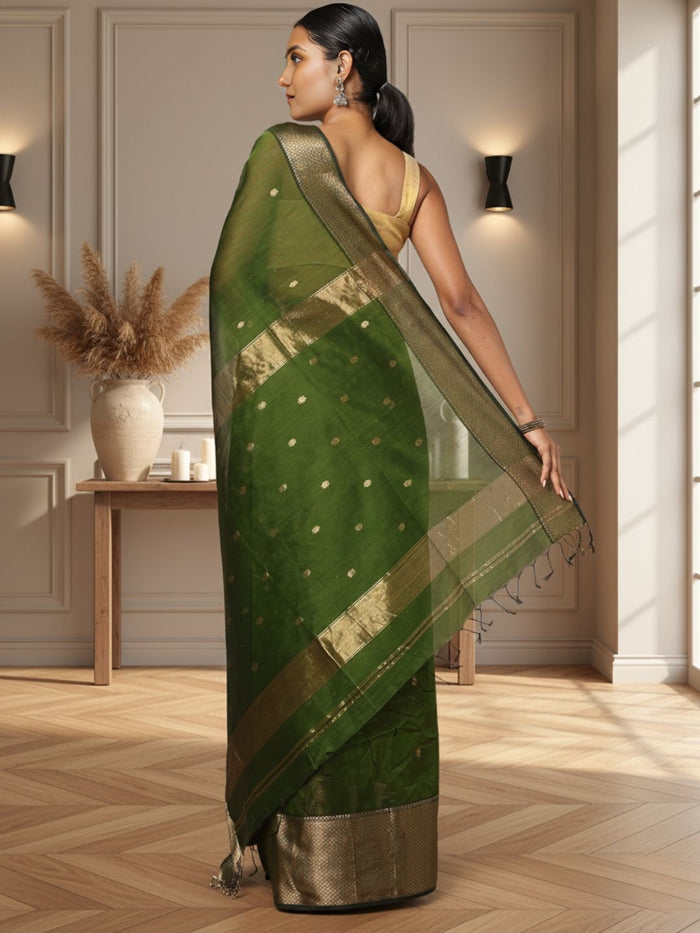 Handloom Maheshwari silk saree in dark olive green, flower buti scattered across the body, with a wide golden zari border