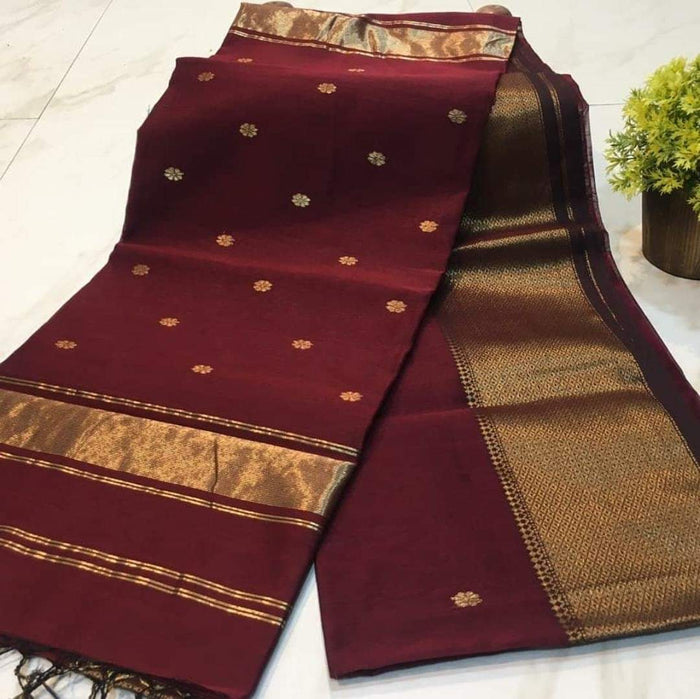 Dark red Maheshwari silk saree with a butta body of small buti and wide antique gold and brown borders, handwoven in Maheshwar
