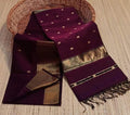 Dark violet Maheshwari silk saree with a butta body of small gold buti and wide gold and black borders, handwoven in Maheshwar
