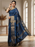 Handloom Maheshwari silk saree in deep blue, flower buti scattered across the body, with a wide golden zari border