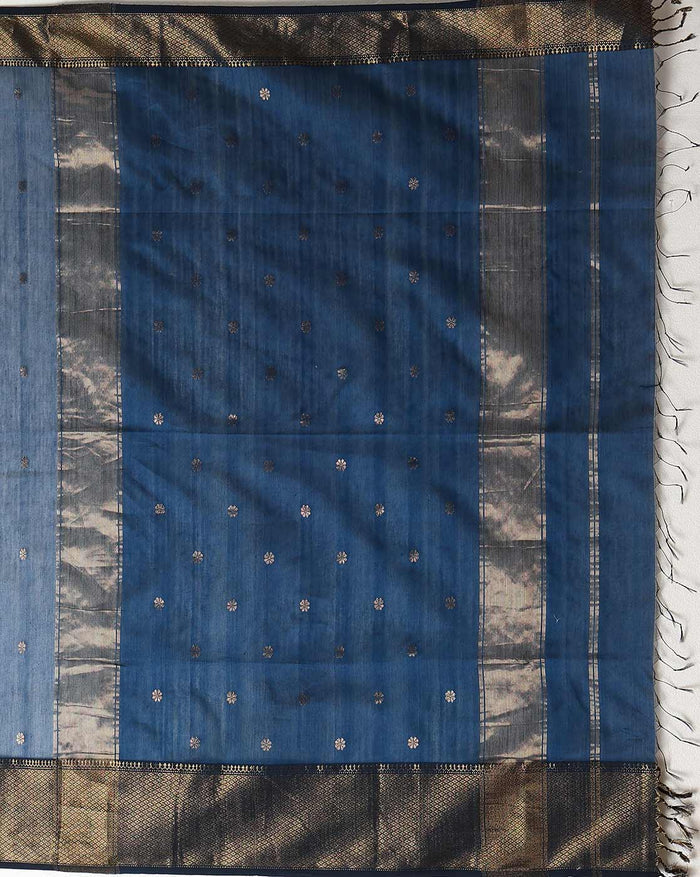 Handloom Maheshwari silk saree in deep blue, flower buti scattered across the body, with a wide golden zari border
