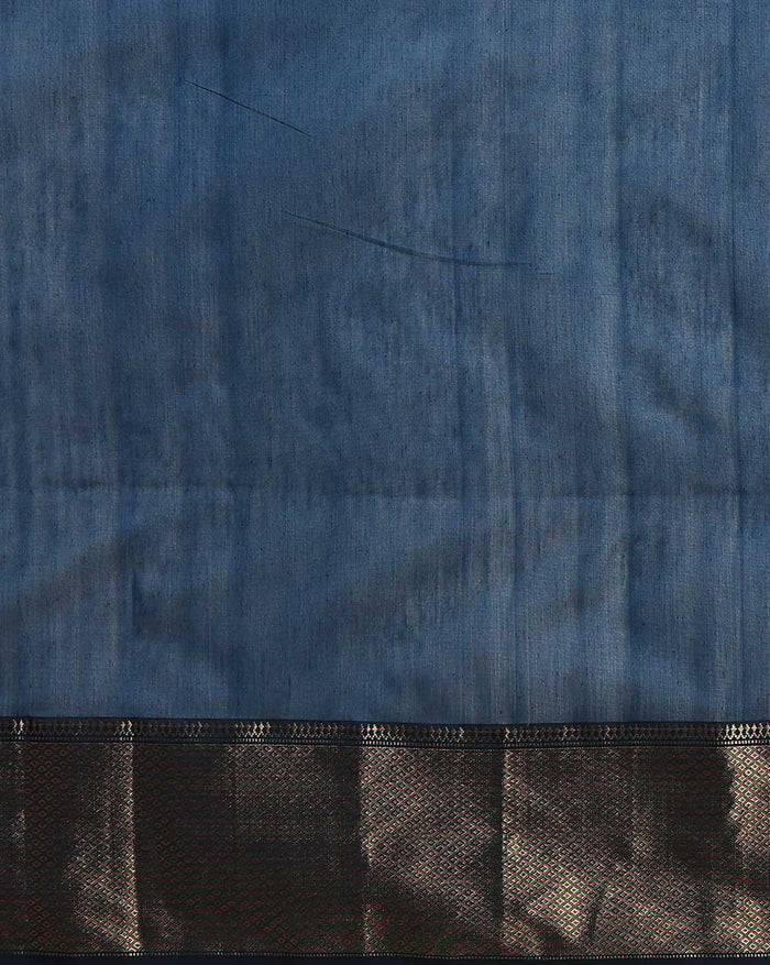 Handloom Maheshwari silk saree in deep blue, flower buti scattered across the body, with a wide golden zari border