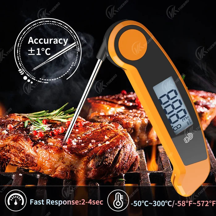 Foldable probe meat thermometer measuring temperature of steaks on a grill.