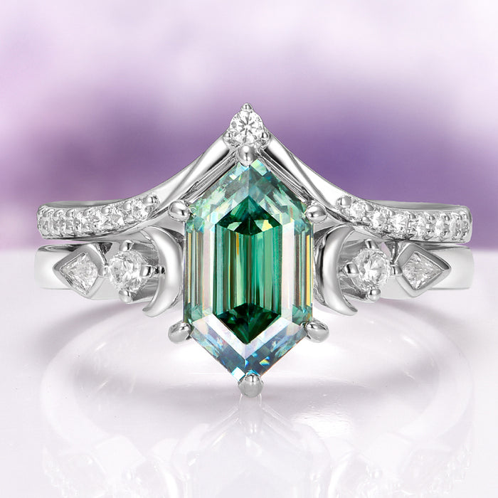 Elara Pacific Green Moissanite & Crescent Moon Engagement Ring Set in 14K White Gold by Aquamarise Gold features a stunning hexagonal green moissanite center stone framed by crescent moon and diamond accents, crafted with celestial elegance.