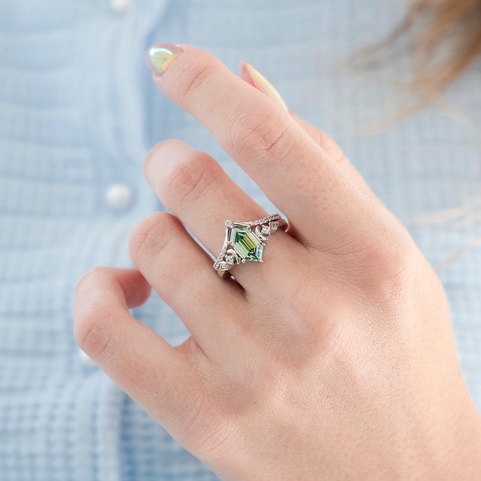Elara Pacific Green Moissanite & Crescent Moon Engagement Ring Set in 14K White Gold by Aquamarise Gold featuring a cyan moissanite center with crescent moon accents, combining celestial inspiration with elegant craftsmanship.