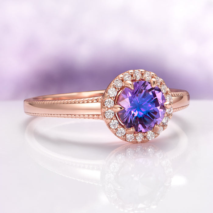 Ella Alexandrite Engagement Ring in 14K Solid Rose Gold by Aquamarise Gold features a vibrant round alexandrite center stone surrounded by a halo of sparkling diamonds on a finely detailed rose gold band, part of Solid Gold Engagement Rings and June Birthstone Jewelry collections.