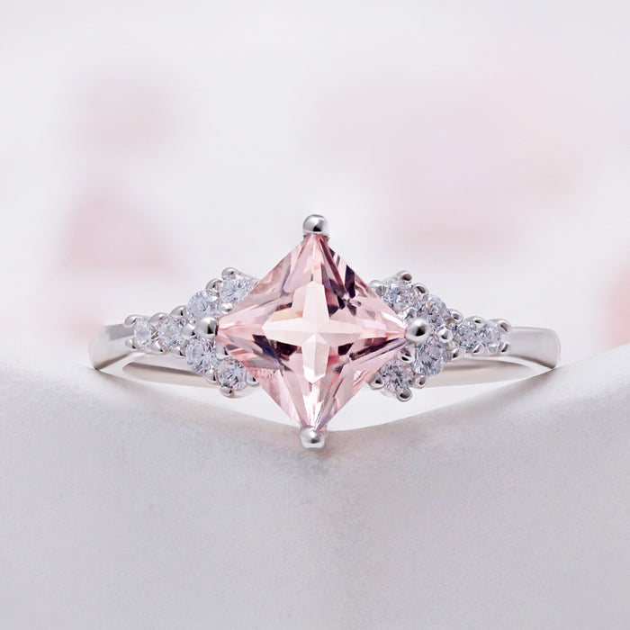 Ellie Princess Cut Morganite Engagement Ring in Sterling Silver by Aquamarise, angled view showing the princess-cut morganite and split shoulders.