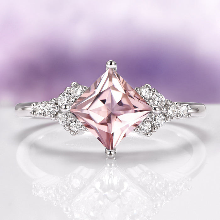 Ellie Princess Cut Morganite Engagement Ring in Sterling Silver by Aquamarise featuring a blush pink princess-cut morganite with shimmering simulated diamond accents in a romantic design