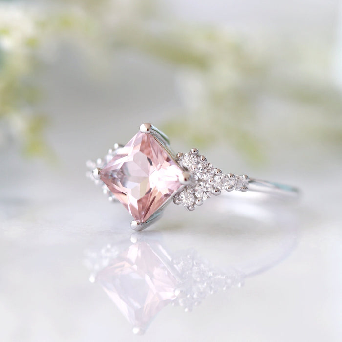 Ellie Princess Cut Morganite Engagement Ring in Sterling Silver featuring a blush pink princess-cut morganite with sparkling simulated diamond accents by Aquamarise.