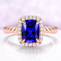 Blue Sapphire Engagement Ring Cushion Cut Ceylon Sapphire on hand over light purple background