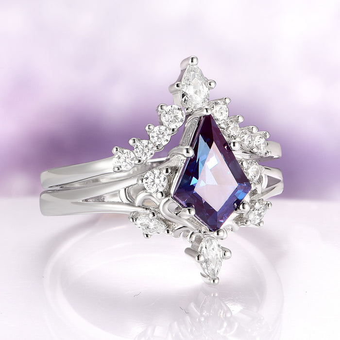 Elowen Kite Cut Lab Grown Alexandrite Ring Set in Sterling Silver by Aquamarise with kite-cut purple-blue alexandrite and sparkling accent stones on a polished silver band