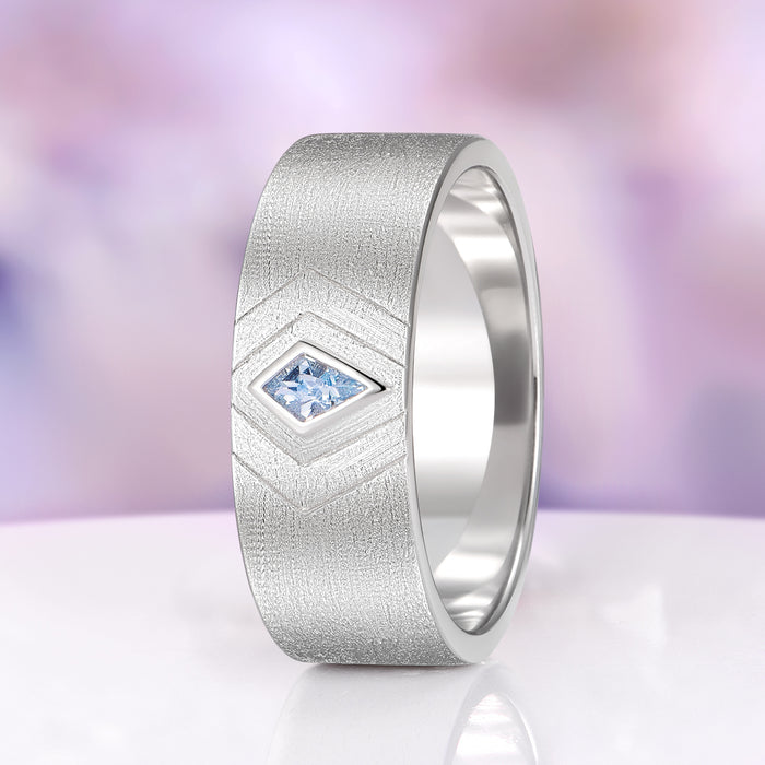 Elowen Aquamarine Couples Ring Set featuring a textured sterling silver band with a rhodium finish, accented by a kite-shaped aquamarine gemstone, part of Aquamarise Matching Couples' Rings and March Birthstone Jewelry collections.
