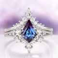 Elowen Kite Cut Lab Grown Alexandrite Ring Set in Sterling Silver with a kite-cut alexandrite center stone and sparkling accent diamonds by Aquamarise.