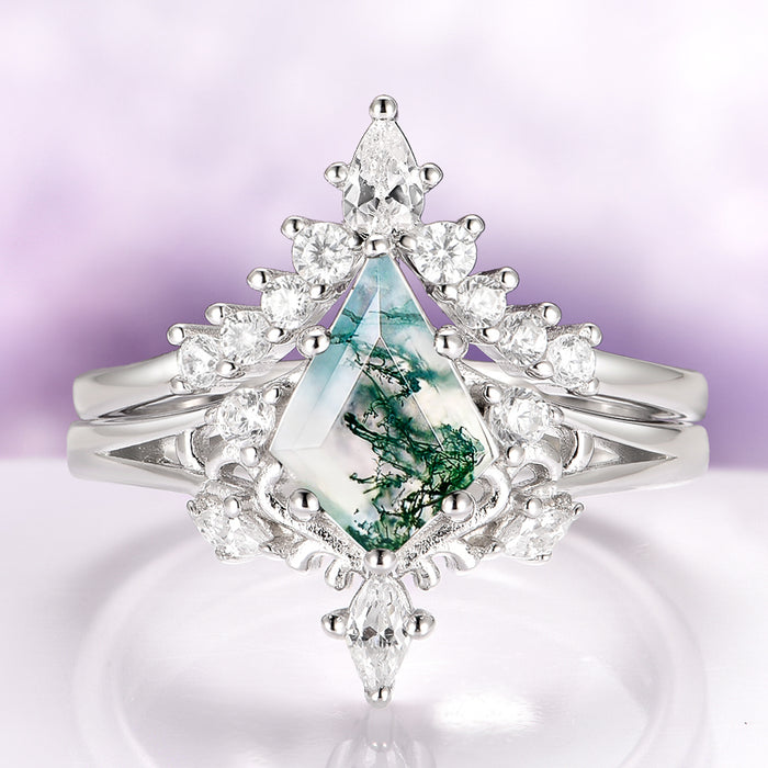 Elowen Kite Cut Green Moss Agate Engagement Ring Set in Sterling Silver by Aquamarise, featuring a kite-cut moss agate center stone surrounded by sparkling clear stones in a nature-inspired design.