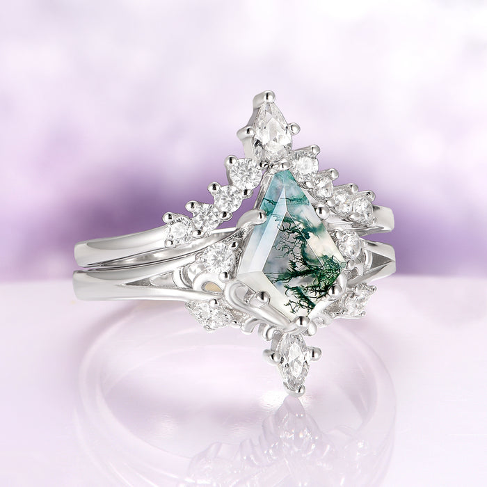 Elowen Kite Cut Green Moss Agate Engagement Ring Set in Sterling Silver by Aquamarise, featuring a kite-cut green moss agate stone surrounded by sparkling clear gemstones.