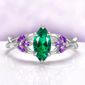 Emerald & Amethyst Mystical Fairy Ring in 14K White Gold by Aquamarise Gold, featuring a marquise emerald center with amethyst accents in an intricate fantasy-inspired design.