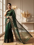 Dark emerald green Maheshwari silk saree with a semi-sheer body, small gold buti and metallic gold borders, handwoven in Maheshwar