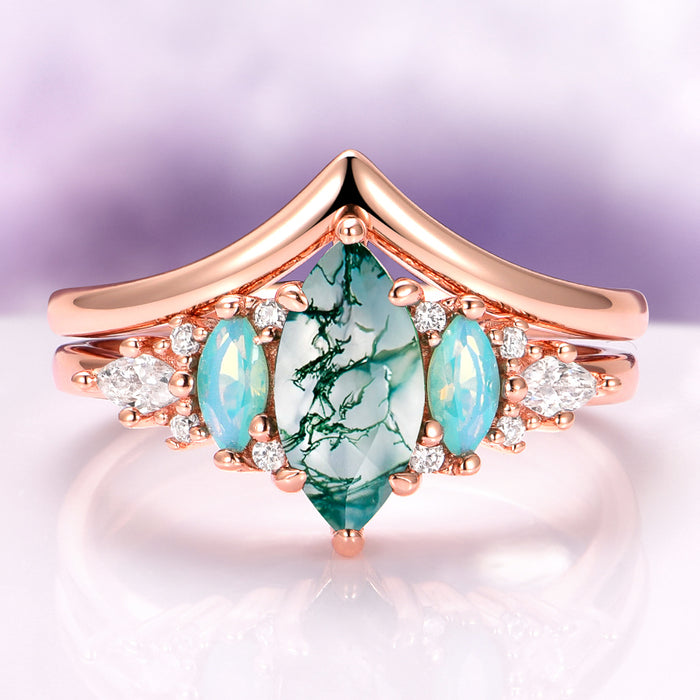 Emerie Moss Agate & Opalescent Sapphire Engagement Ring Set in 14K Solid Rose Gold featuring a marquise moss agate center flanked by opalescent sapphires and sparkling diamonds, crafted by Aquamarise Gold from nature-inspired and birthstone collections.