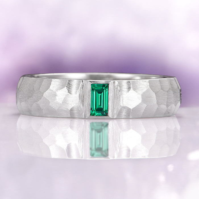 Hammered Emerald Wedding Band in 14K White Gold (5.5mm) featuring a hammered brushed finish with a rectangular emerald centerpiece, embodying timeless elegance by Aquamarise Gold.