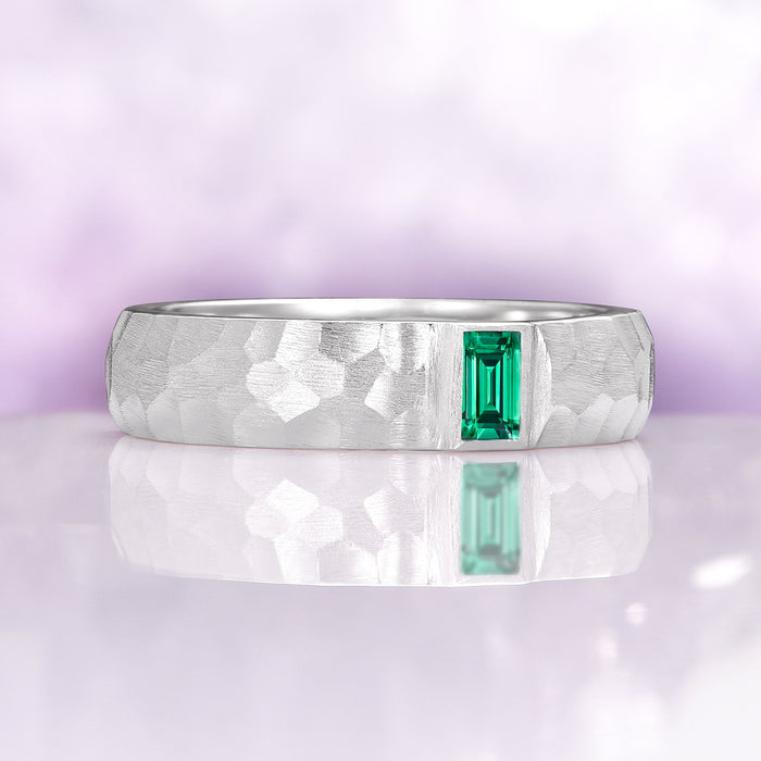 Hammered Emerald Wedding Band in 14K White Gold (5.5mm) with a brushed texture and rectangular emerald, showcasing Aquamarise Gold’s craftsmanship and May Birthstone Jewelry elegance.