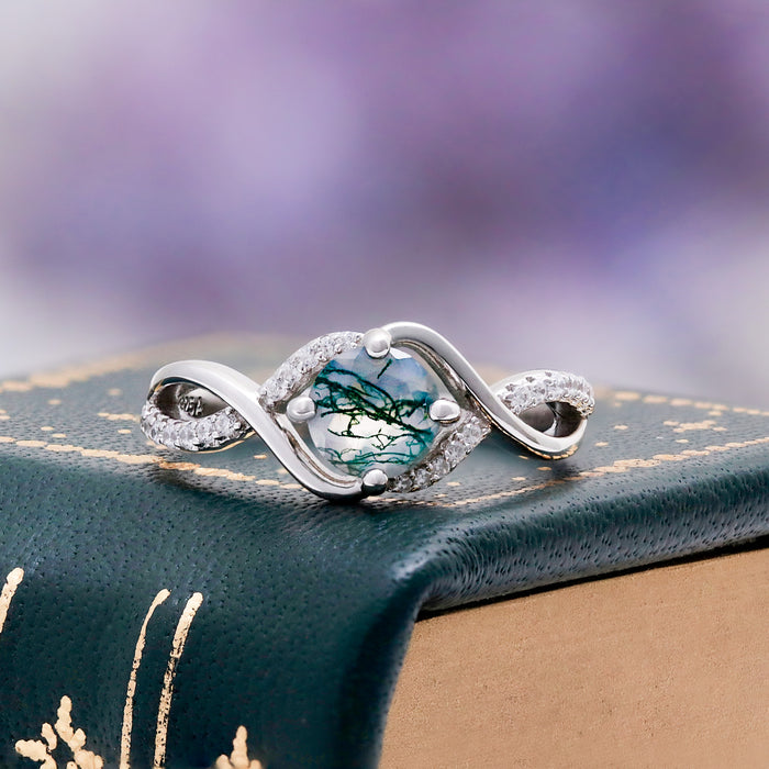 Entwined green moss agate ring with organic twisted band